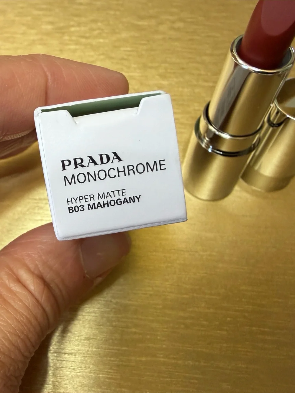 Prada Monochrome Hyper Matte lipstick in B03 Mahogany. MINI size. 0.04oz